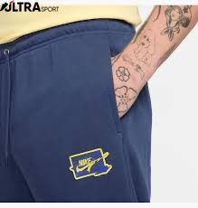 Чоловічі штани NIKE M CLUB FT CUFF PANT BOLT FZ0766-410 ціна