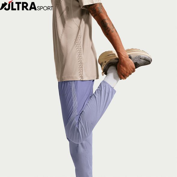 Чоловічі штани NIKE M NK RPL STRIDE NVLTY WVN PANT IF2020-506 ціна