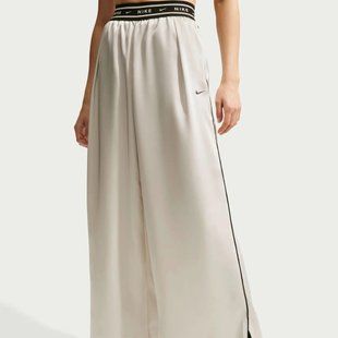 Жіночі штани NIKE W NSW OFFLN WVN STN PANT IH1326-072 ціна