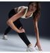 Жіночі легінси NIKE W NK Dri-FIT SWIFT HR 7/8 TIGHT HJ2252-010 ціна
