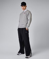 Штани чоловічі Nike M Woven Pant Naos FD7611-010 ціна