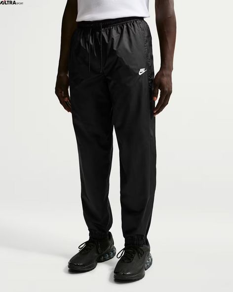 Штани чоловічі Nike Windrunner HV8371-010 ціна