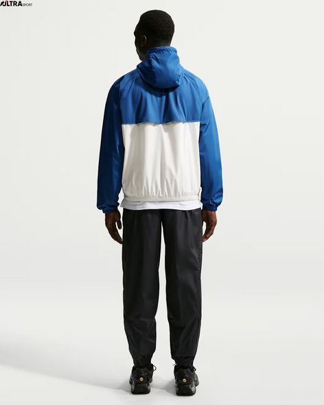 Штани чоловічі Nike Windrunner HV8371-010 ціна