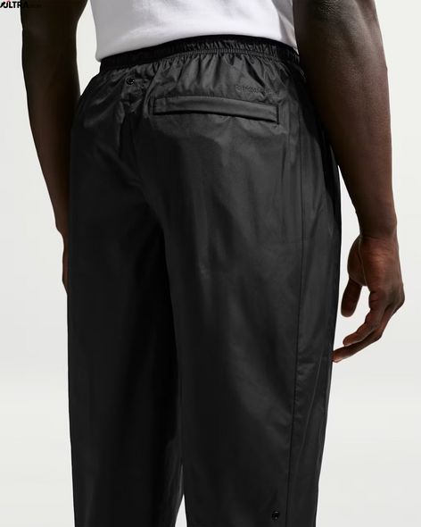 Штани чоловічі Nike Windrunner HV8371-010 ціна