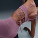 Топ жіночий NIKE W INF STRPY WRAP BRA FV6508-523 ціна