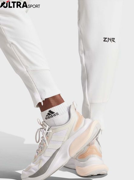Штани спортивні жіночі adidas Z.N.E. Woven IS1874 ціна