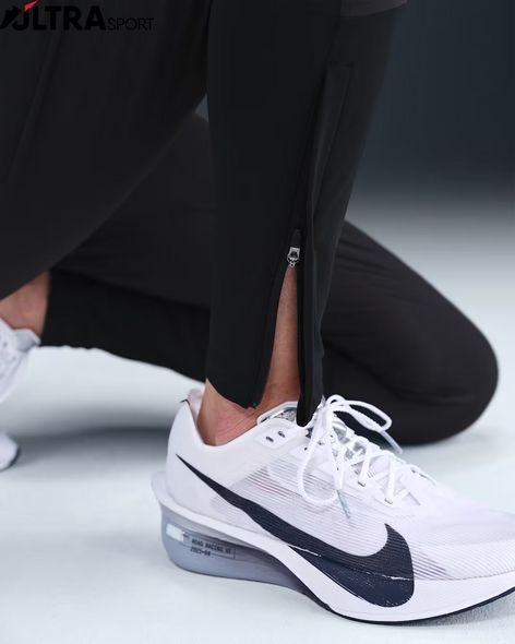 Жіночі штани NIKE W NK SWIFT DF MR PANT HV6088-010 ціна